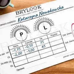Recepta okularowa Katarzyny Nowakowskiej. Wskazuje parametry soczewek, w tym "Oś" (75 i 45 stopni), co jest kluczowe dla prawidłowego ustawienia okularów.